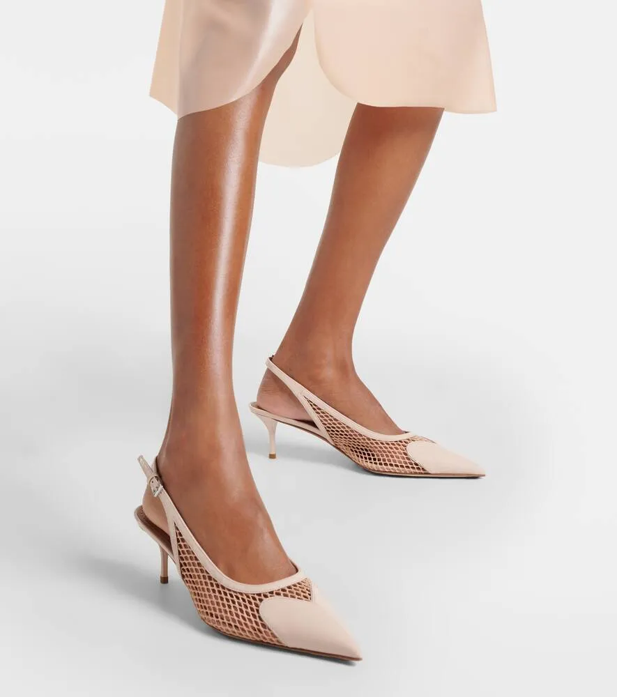Alaia Le C√Ö¬ìur fishnet leather slingback pumps
