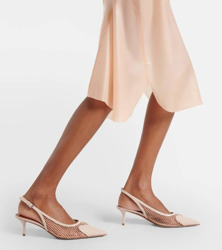 Alaia Le C√Ö¬ìur fishnet leather slingback pumps